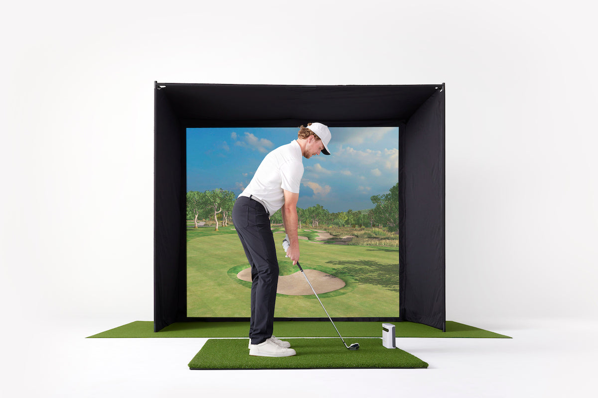 Man Hitting on SKYTRAK golf simulator studio
