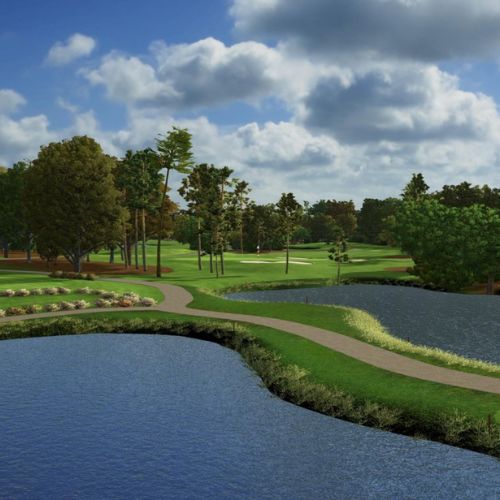 Innisbrook golf club with green fairway, trees, and a pond under a blue sky with clouds.