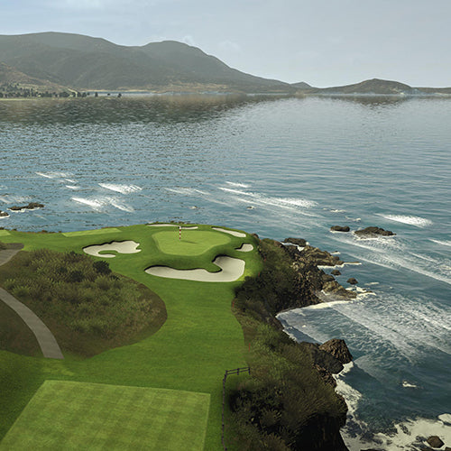 Pebble beach Golf course with ocean and mountains in the background