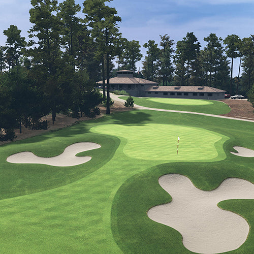 Spyglass Hill Golf course with green fairway, sand bunkers, and clubhouse in the background.