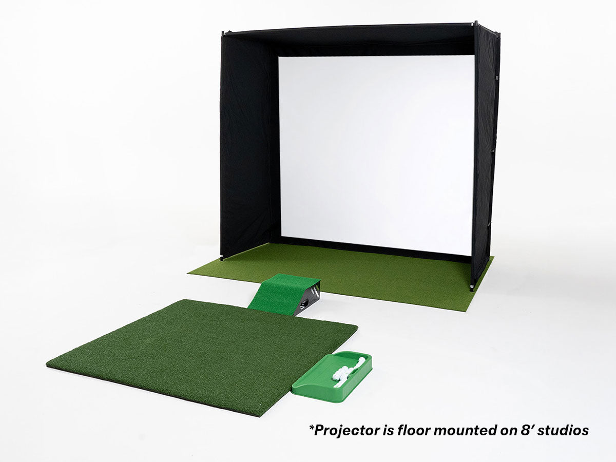 Golf simulator setup with screen, green mat, and projector on a white background