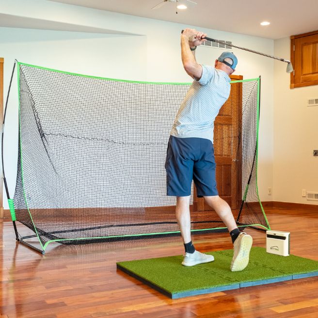 Indoor setup using the SKYTRAK+ launch monitor, 5x3 interlocking mat, and 10x7 net