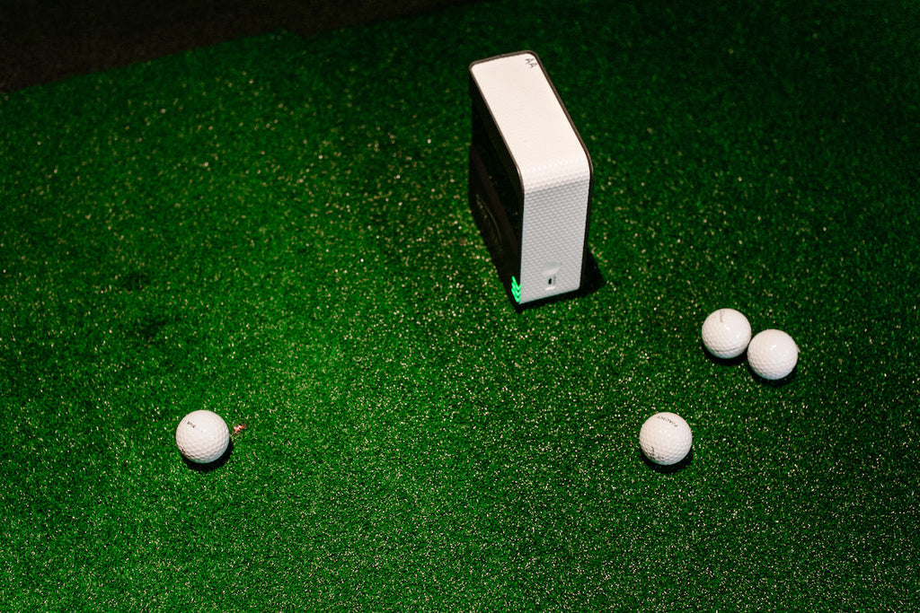 SkyTrak launch monitor ready to track a golfball on turf