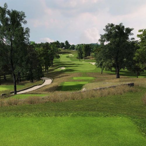 Hudson National course with green grass, trees, and a clear sky
