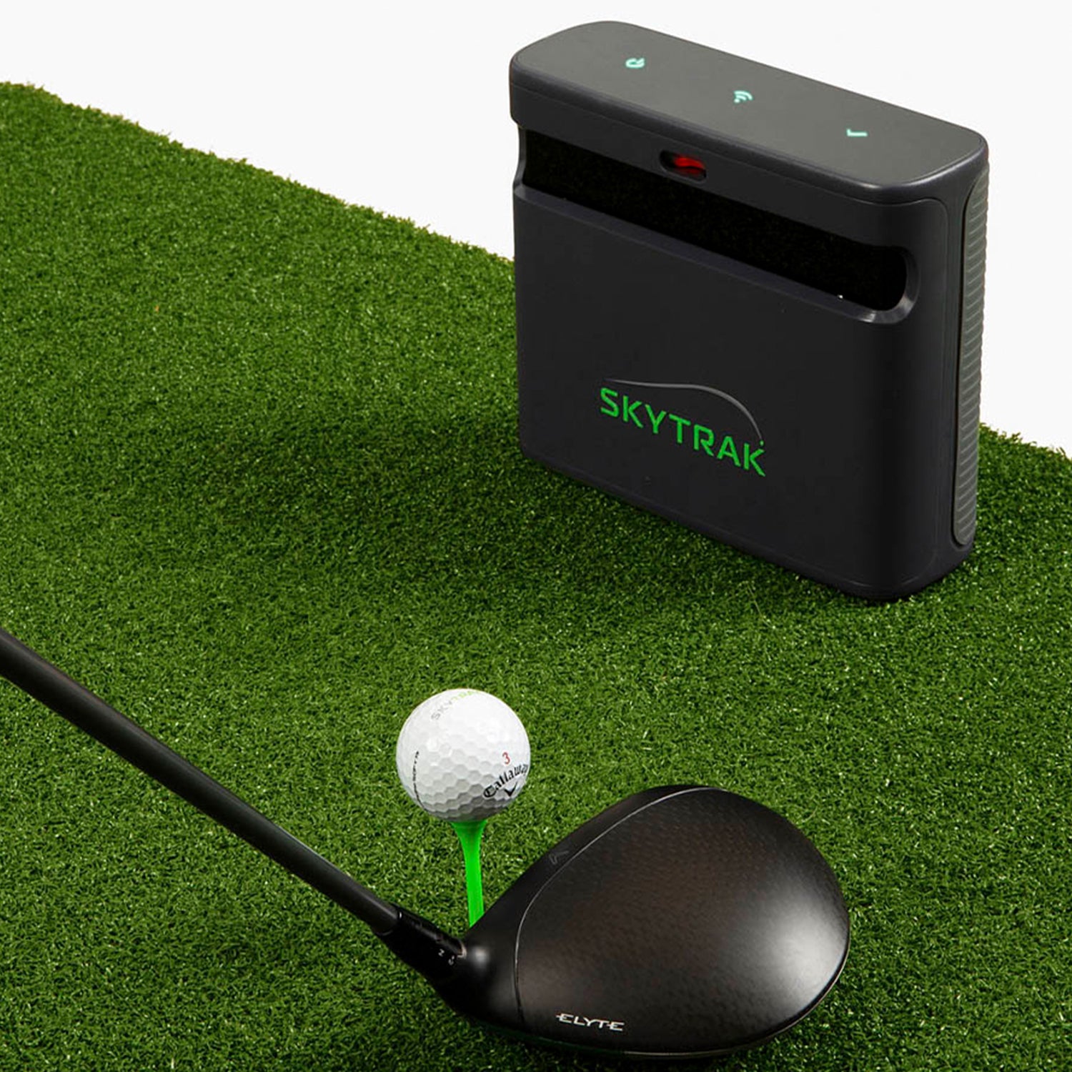 SKYTRAK ST MAX golf launch monitor on a hitting mat with a golf club and ball.