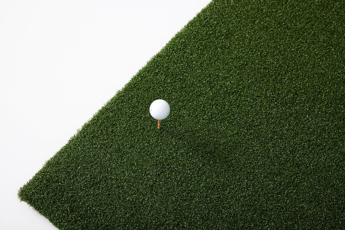 Ball on tee in SKYTRAK hitting mat golf simulator accessories